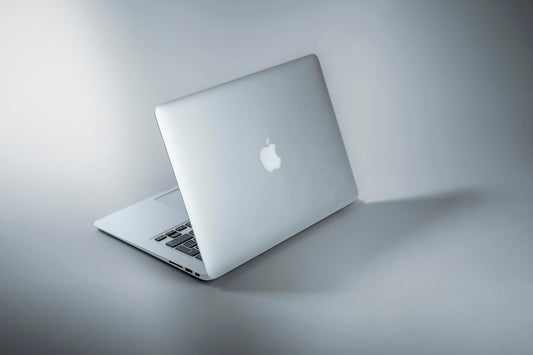 Silver laptop on a white table