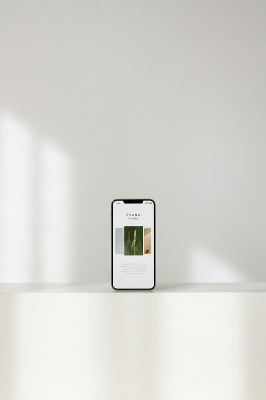 Smartphone standing on a white table