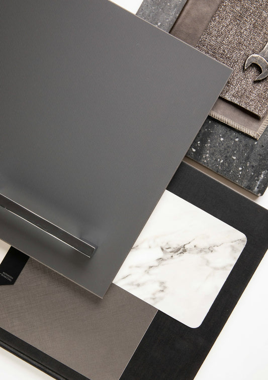 Neutral material samples arranged on a white surface