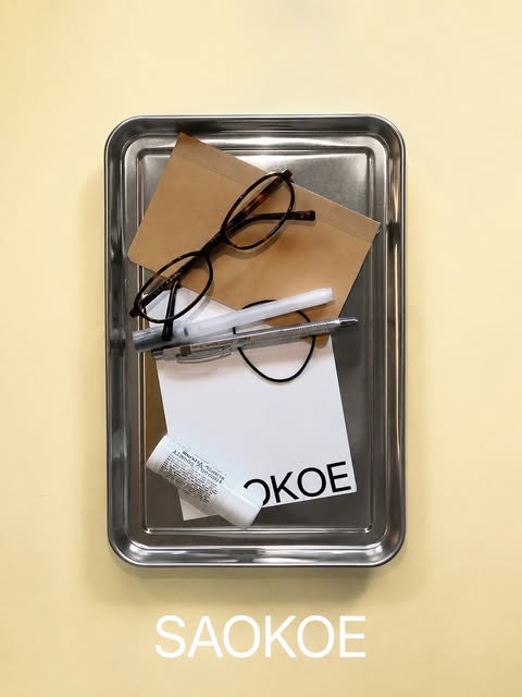 Saokoe Studio stationery and brand identity flat lay